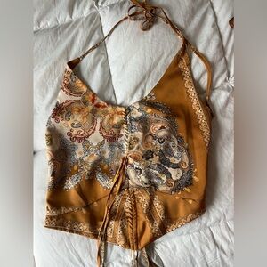 Super down halter tank top. Cinch at front detail to make more of a deep v neck